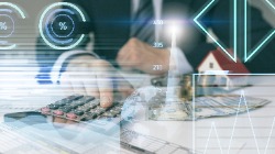 Man using calculator with tech overlays