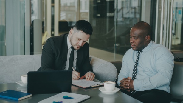 Two finance recruiters working on a vacancy