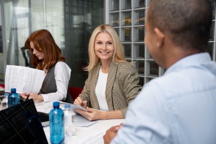 Sales recruiters talking with sales professional