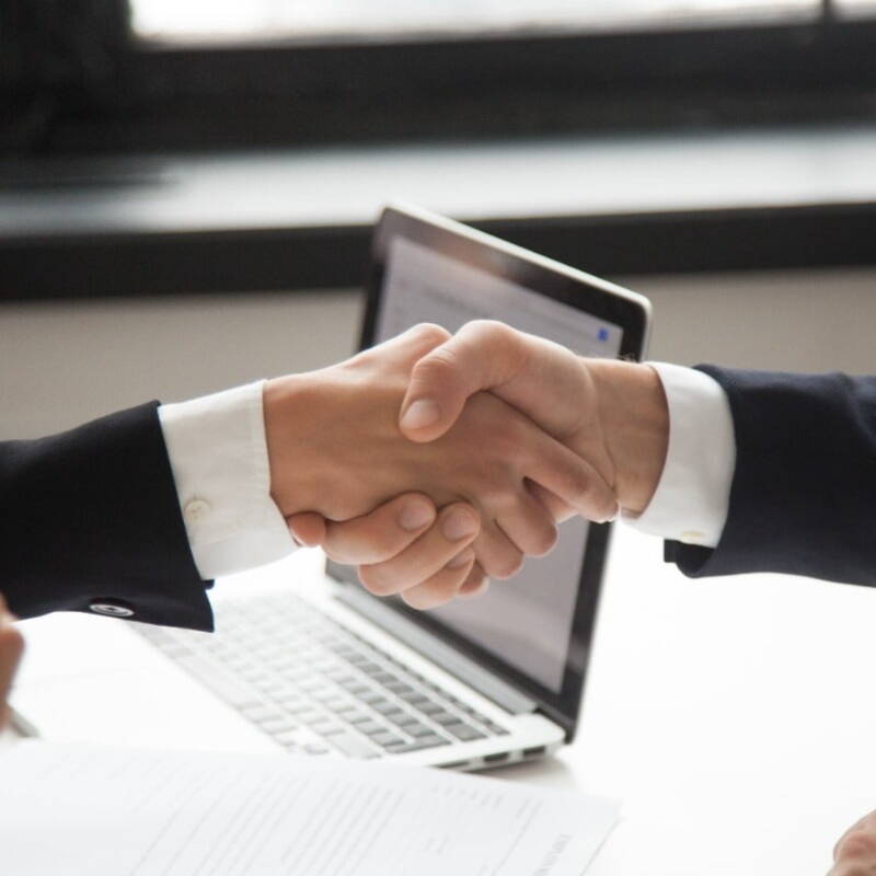 Sales recruiters shaking hands