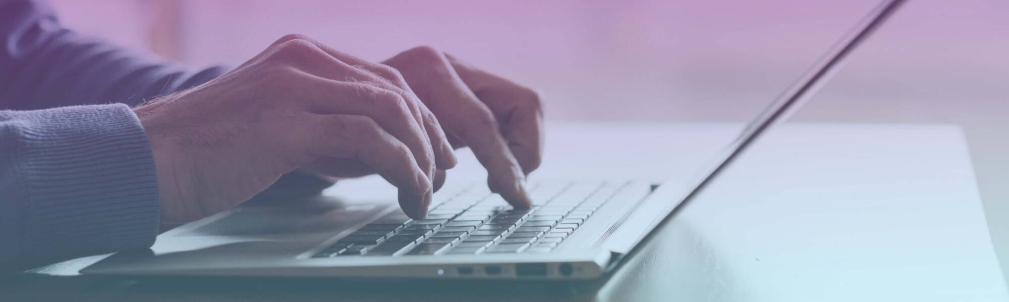 Person typing on a laptop