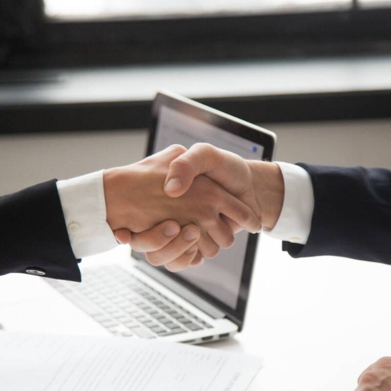 Two people shaking hands